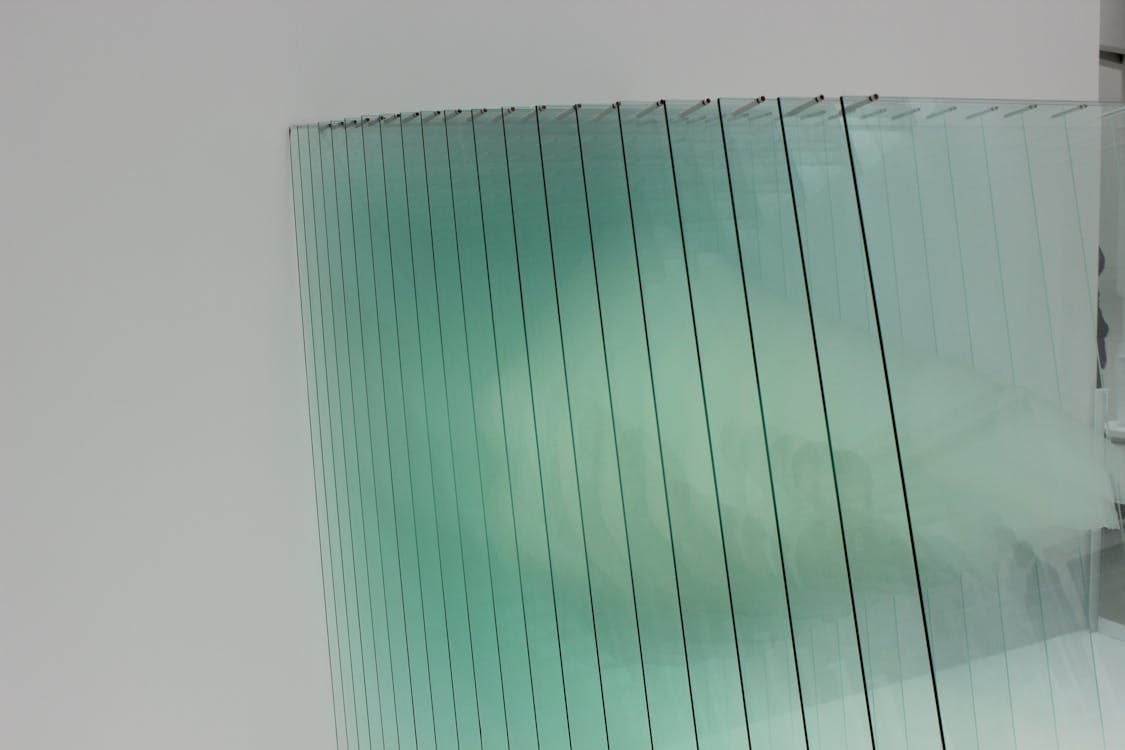 Free Clear Glass Panels on White Surface Stock Photo