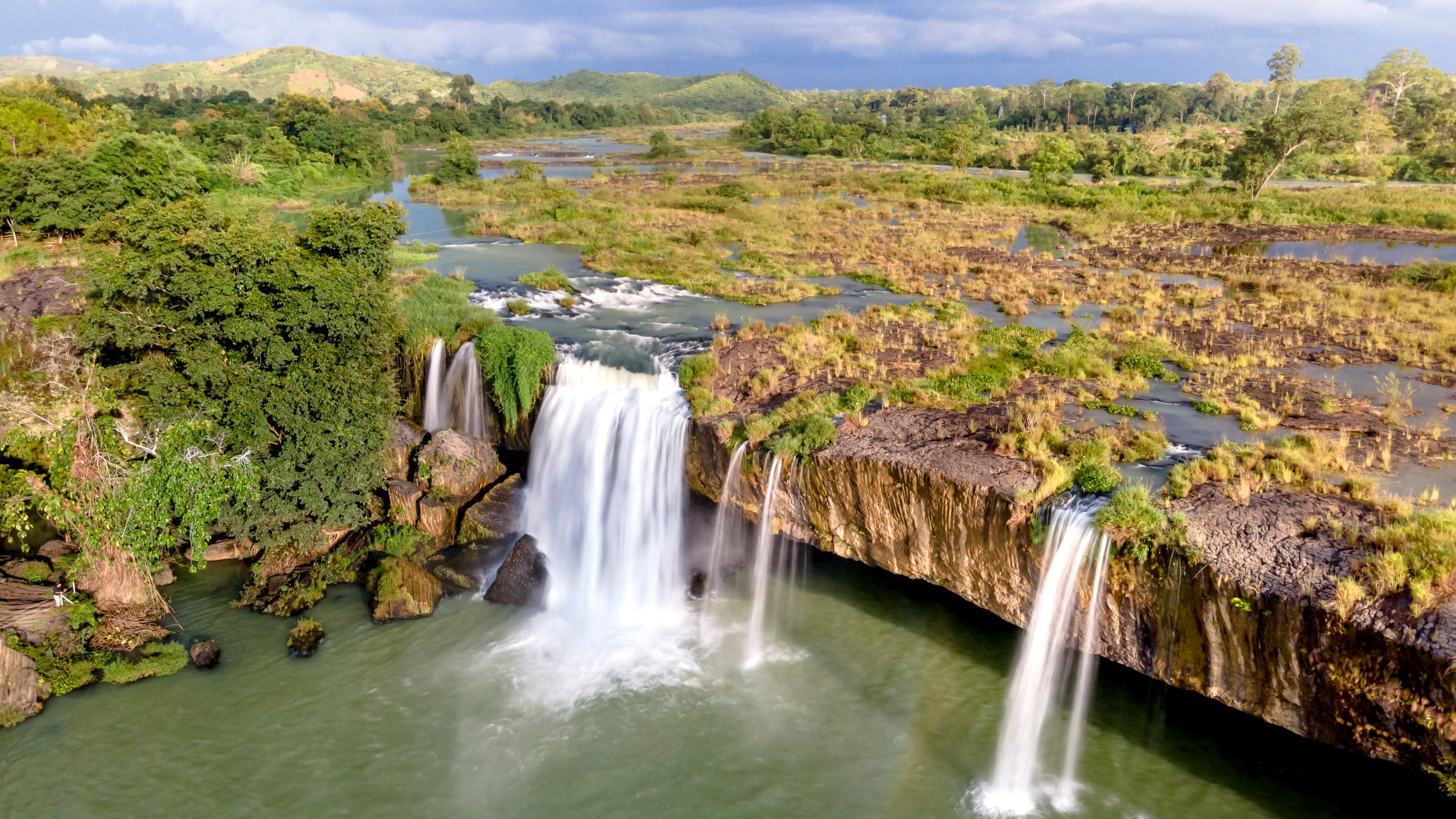 Stunning aerial view of Dray Nur Waterfall surrounded by lush landscape in Vietnam.