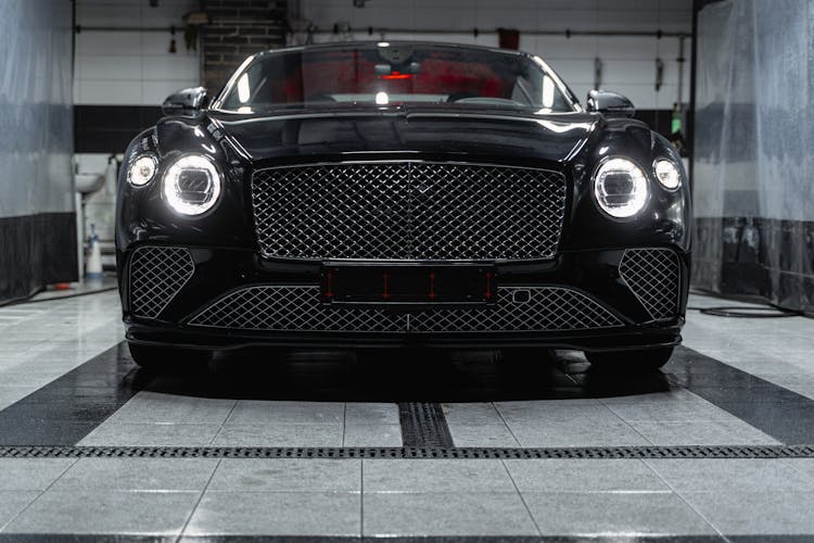 A Black Bentley In A Car Wash