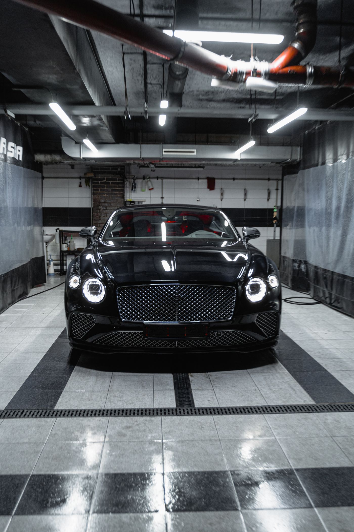 Black Bentley Continental GT after washing