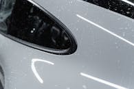 Water Droplets on a White Car