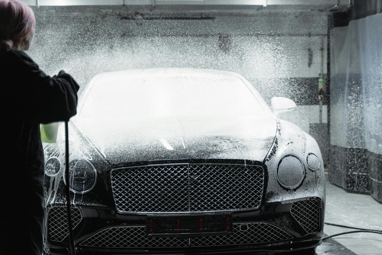 Luxury car receiving premium foam wash