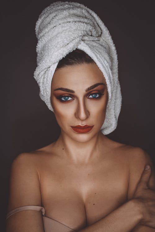 Free Woman with White Towel on Head Stock Photo