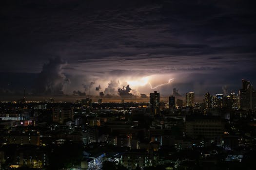 Breathtaking view of lightning storm over Bangkok's skyline at night. Perfect for dramatic cityscape shots.