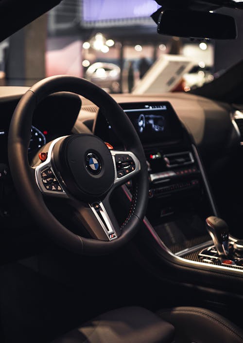Free Close-Up Shot of a Black Steering Wheel Stock Photo