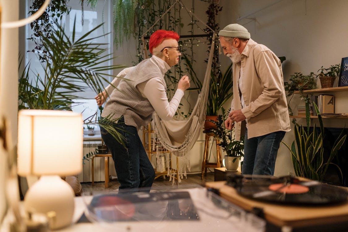 Free Photograph of an Elderly Couple Dancing Together Stock Photo