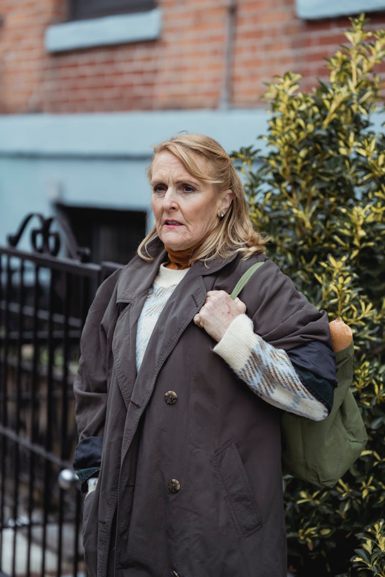 Woman In Warm Clothes With Fabric Bag In Town