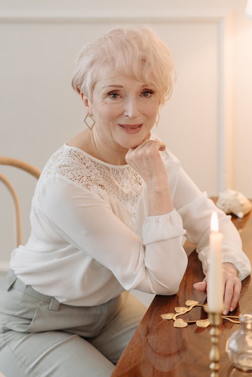 A Woman Sitting at the Table