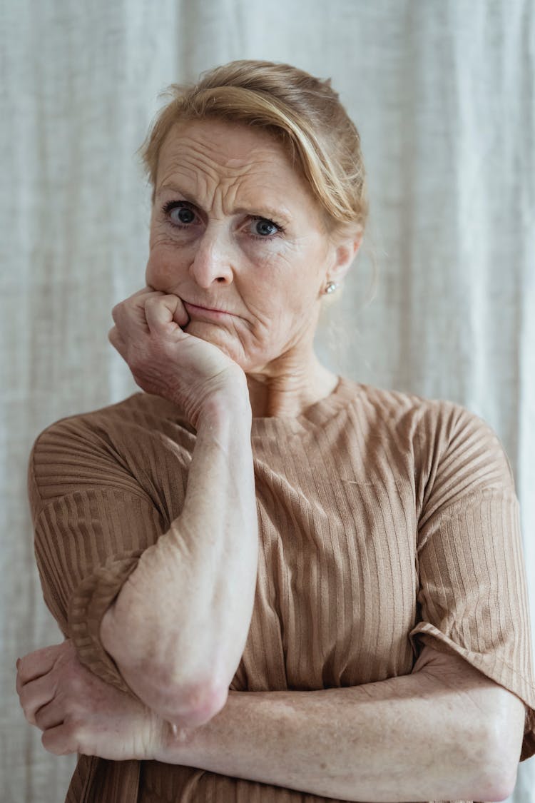 Portrait Of Old Woman Thinking