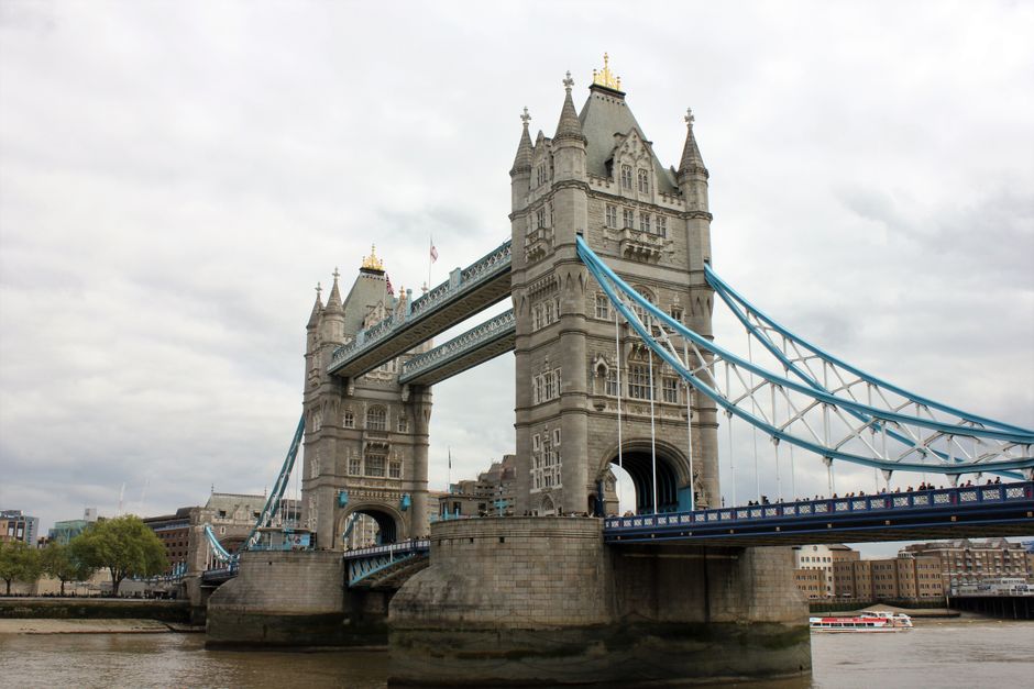 Iconic Tower Bridge spanning the River Thames in London, a notable architectural landmark.