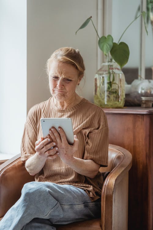 Senior woman having video call