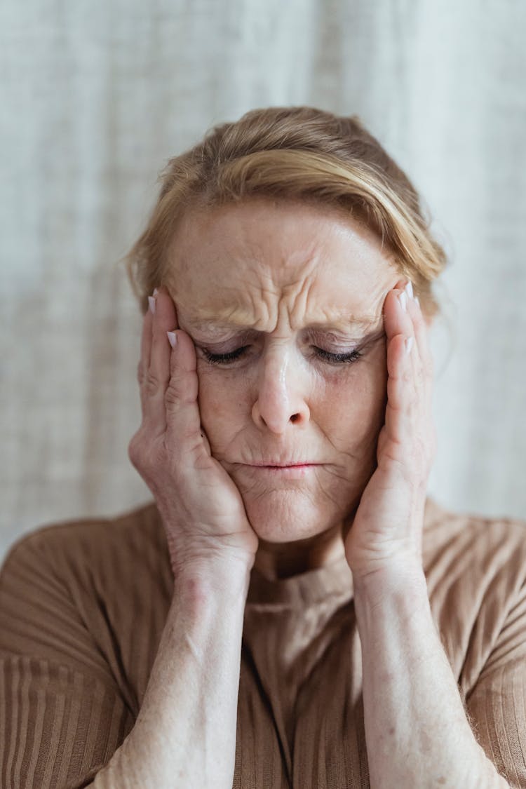 Stressed Mature Woman In Room