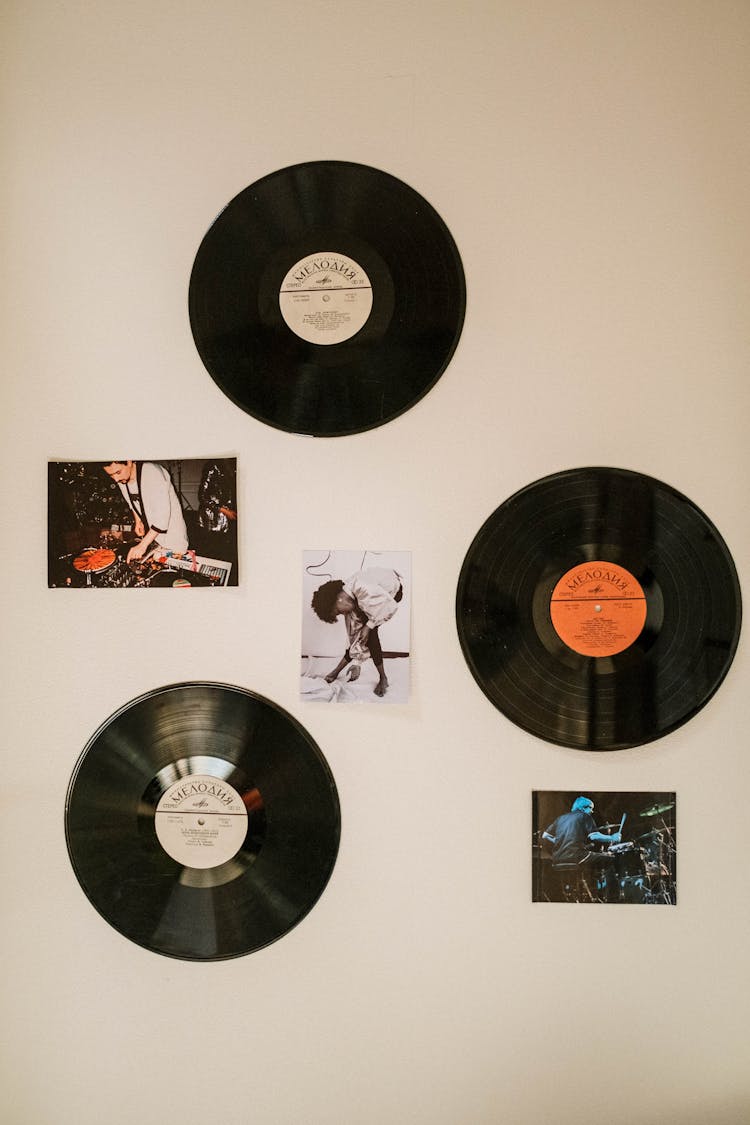 Black Vinyl Records Hanging On The  On  Wall