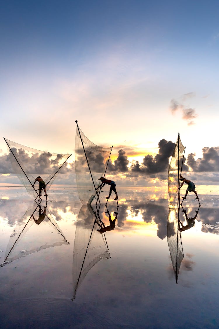 Fishermen Setting Up Nets