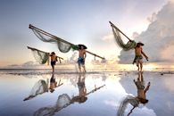 Fishermen Carrying their Fishnets