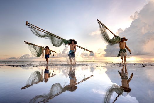 Fishermen Carrying their Fishnets