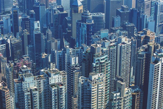 Breathtaking aerial shot of Hong Kong's dense skyscraper skyline, showcasing urban modern architecture.