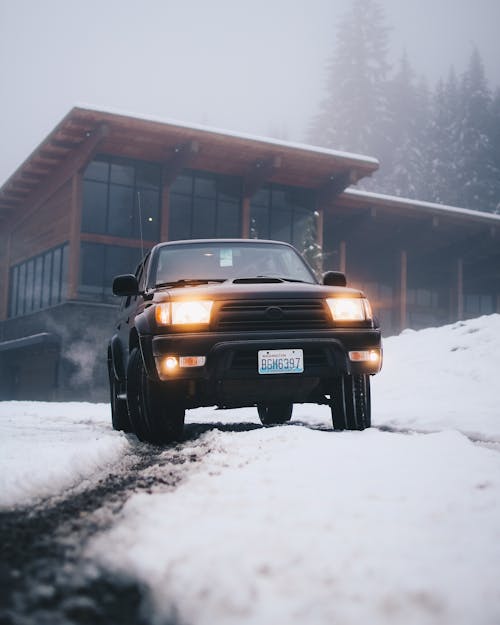 Free Black Toyota Vehicle on Snow Field at Daytime Stock Photo