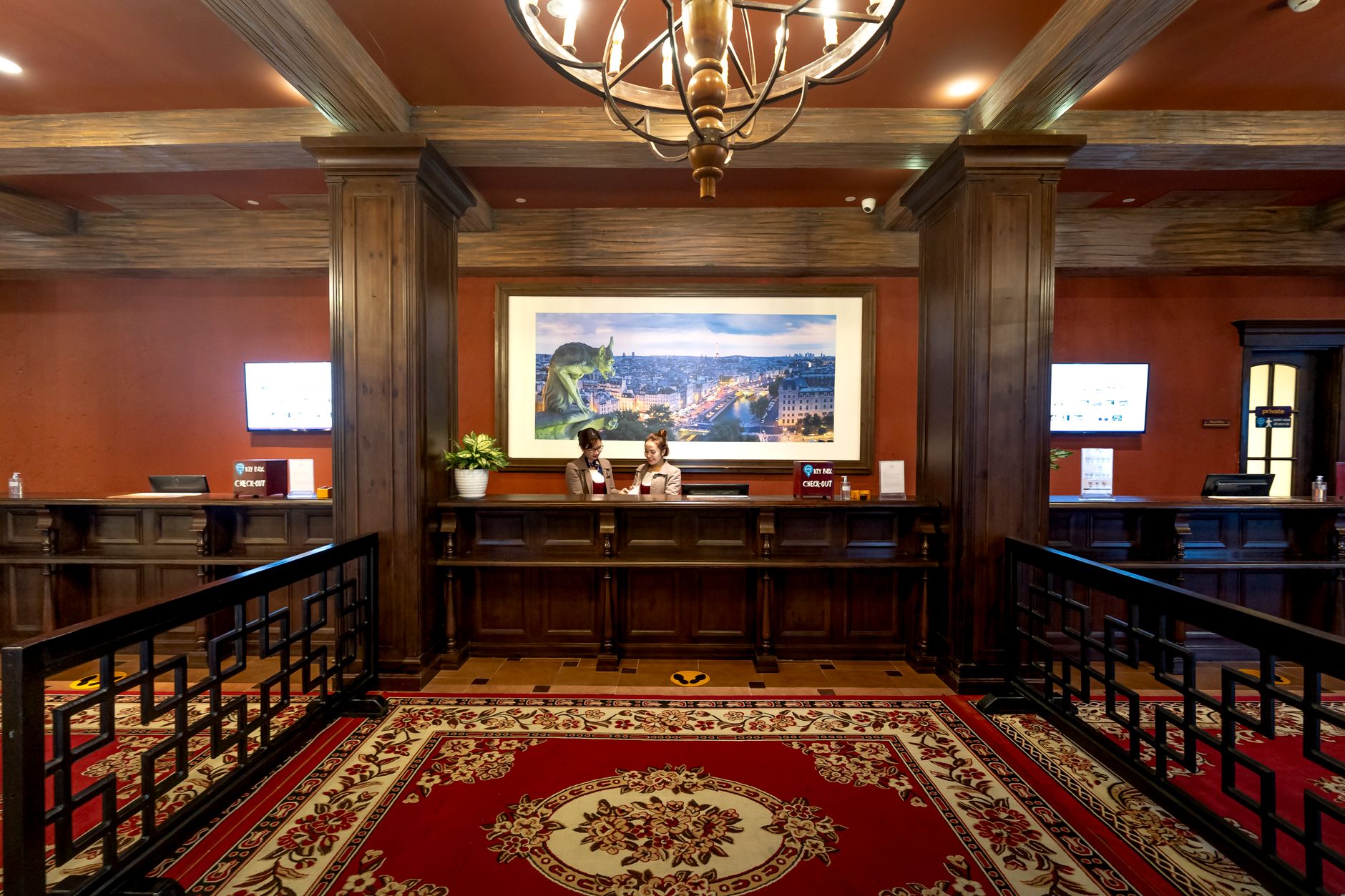 Hotel lobby featuring digital check-in kiosks