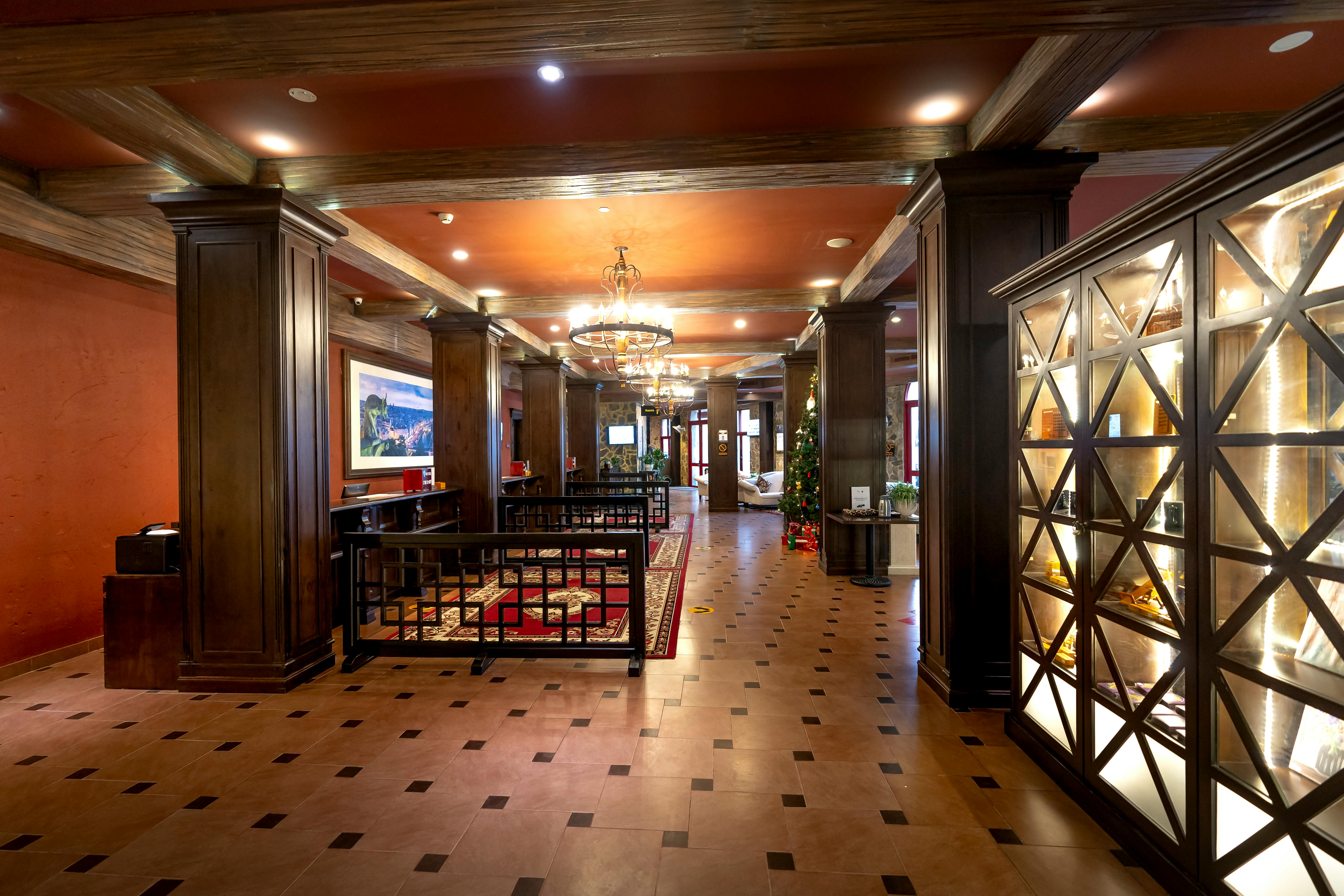 A close-up of a hand holding a smartphone displaying a health monitoring app with heart rate data, relevant for personalized health.