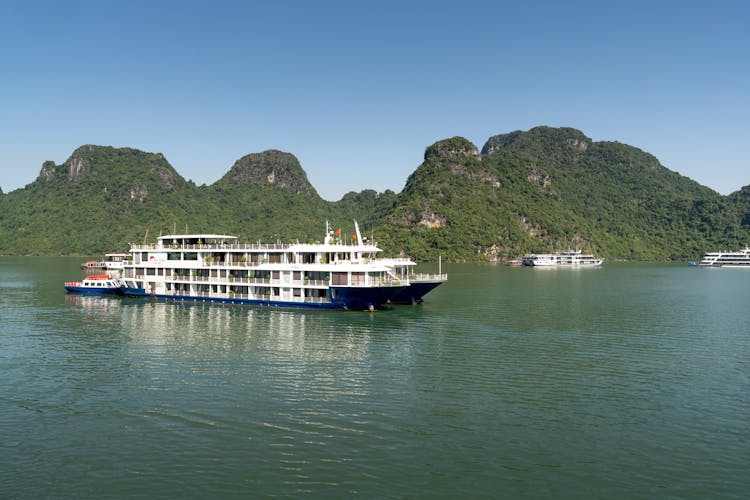 White And Blue Ship On The Lake