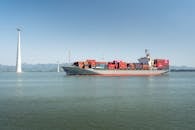 Cargo Ship on Sea Under the Blue Sky
