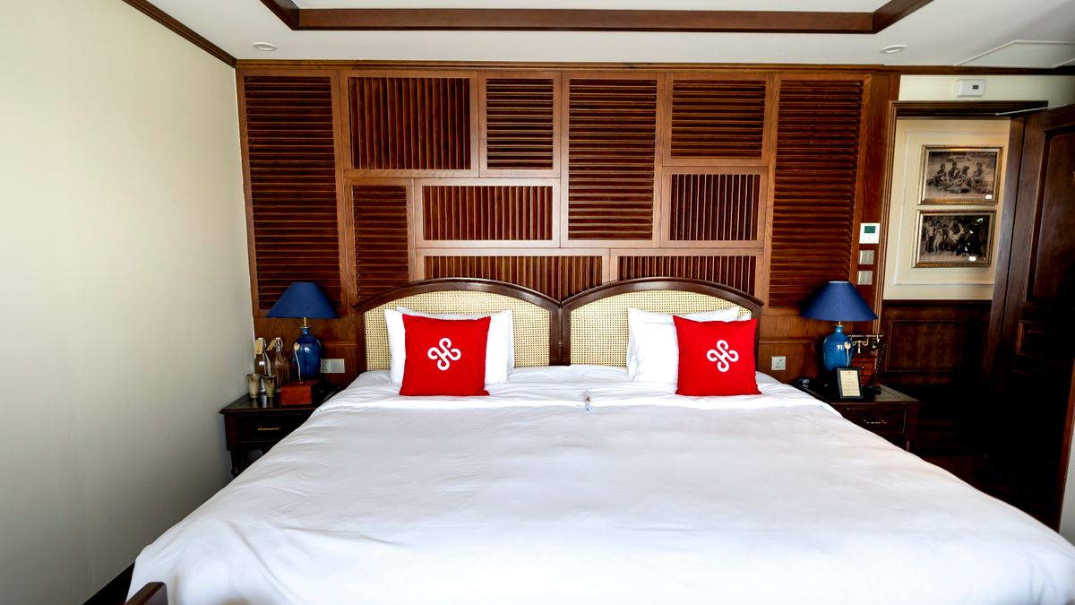 A welcoming hotel room bed in a second hotel during a hotel hop trip