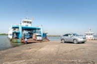 Cars Driving onto a Ferry