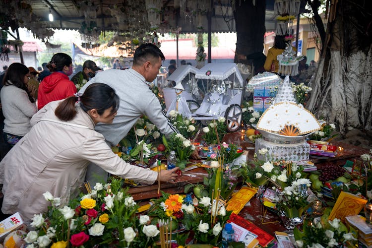 Bouquets Of Flowers On Stall In Market