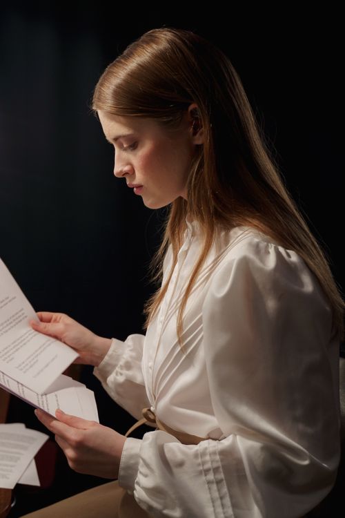 Woman Reading A Script · Free Stock Photo