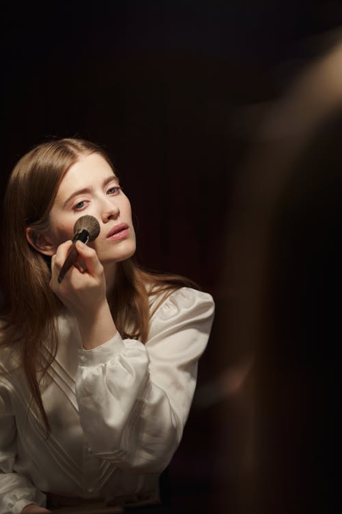 Woman Applying Makeup