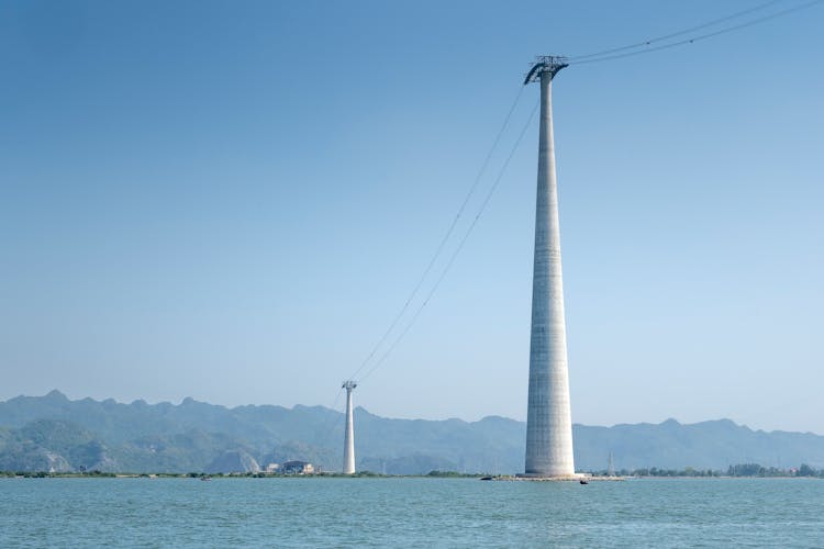 Wires On Concrete Pillars In Sea