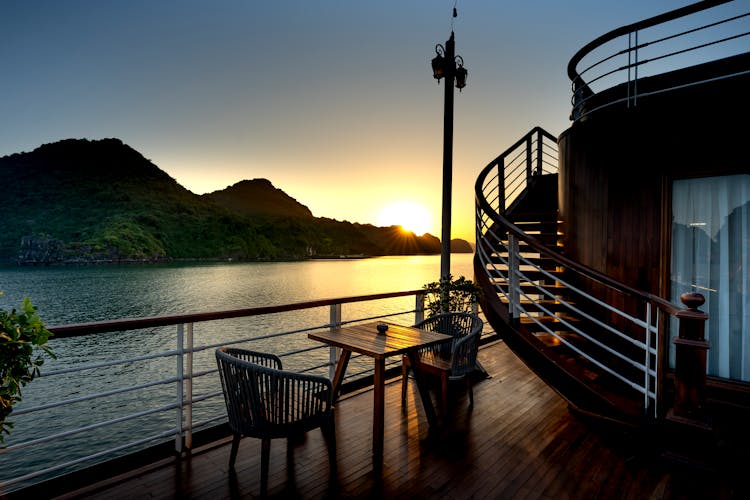 The Deck Of A Ship At Sunset