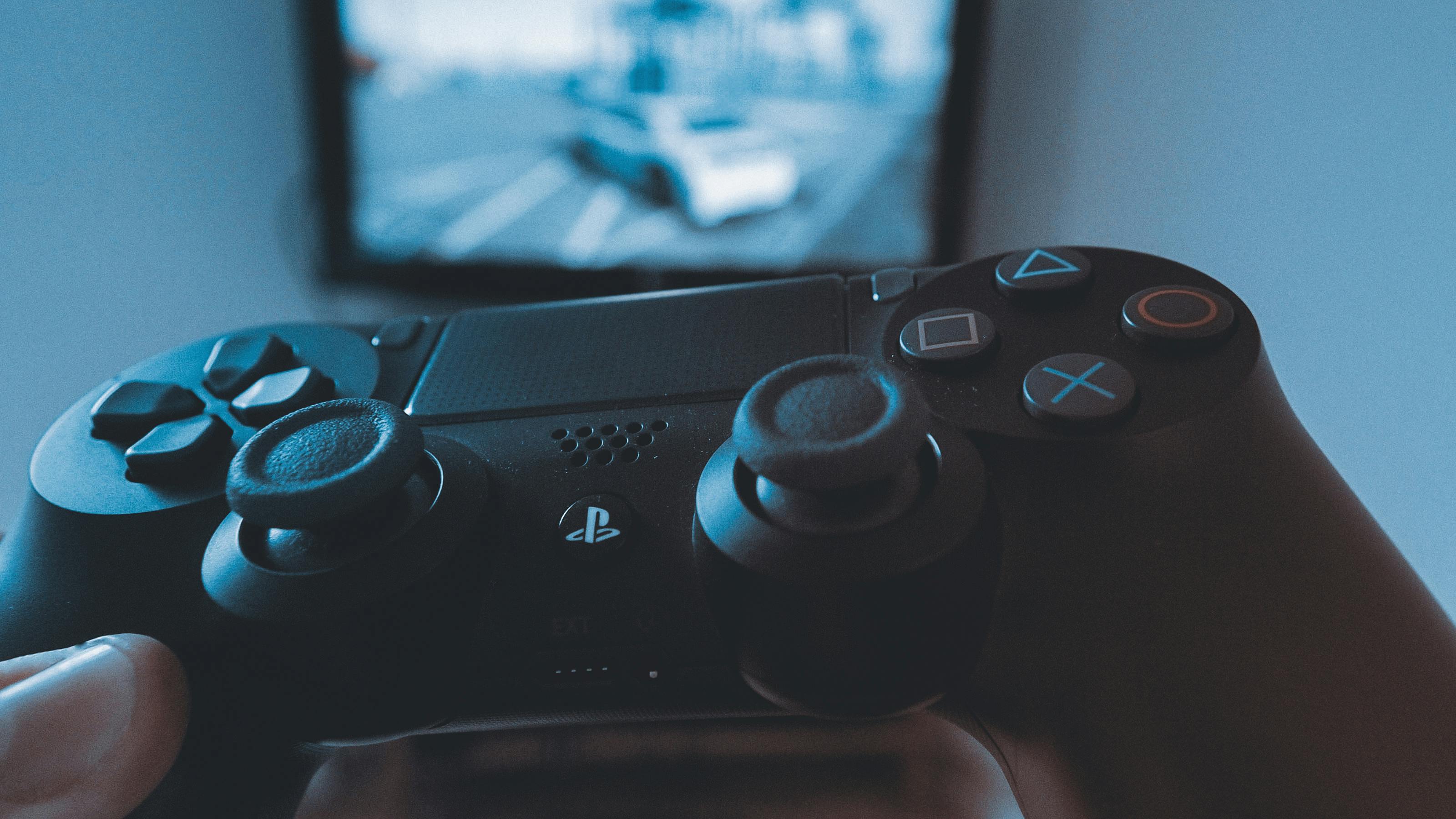 White Sony Ps4 Dualshock Placed on Table \u00b7 Free Stock Photo