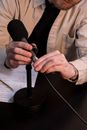 Person Holding Black Microphone on White Paper