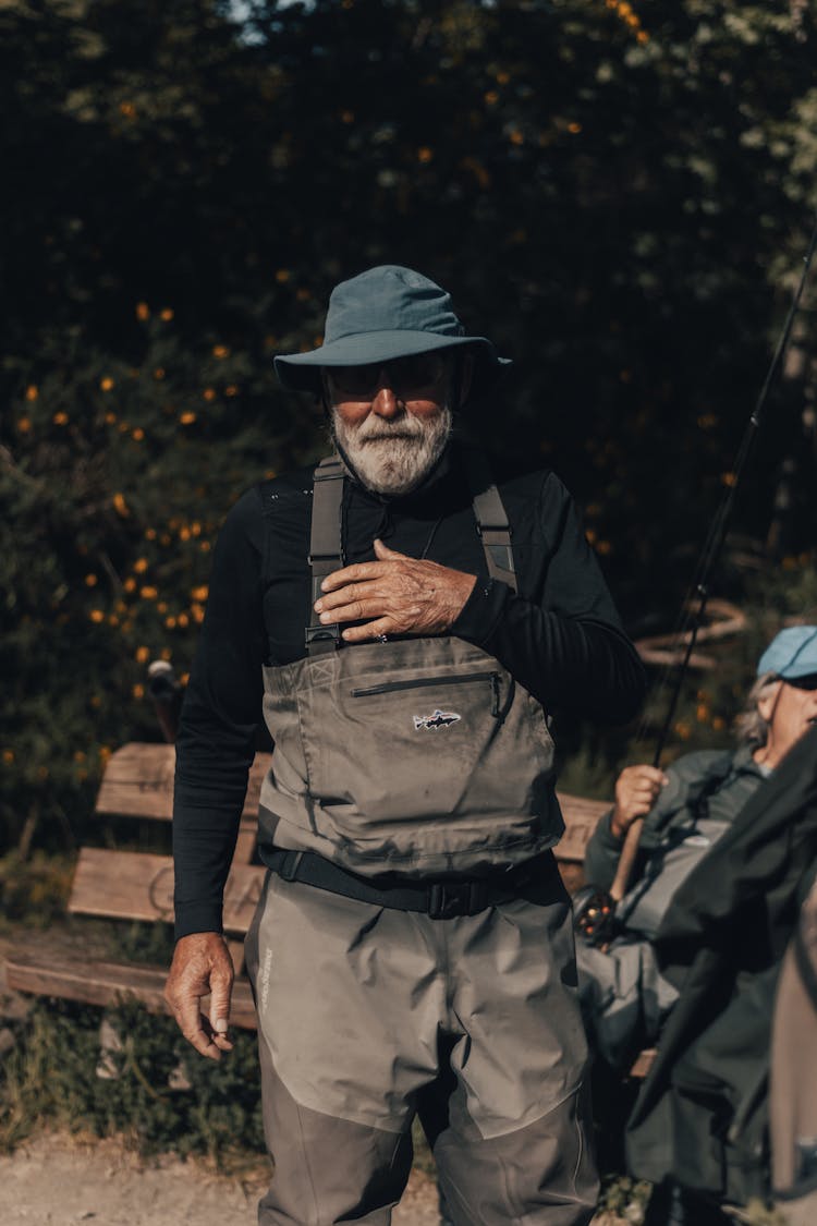 An Elderly Man Wearing Overalls 