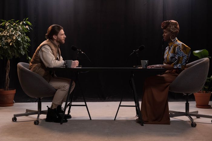 Two hosts recording an interview in a studio, photo by cottonbro studio on Pexels