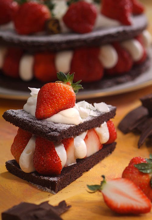 A Chocolate Cake with Strawberries and Cream