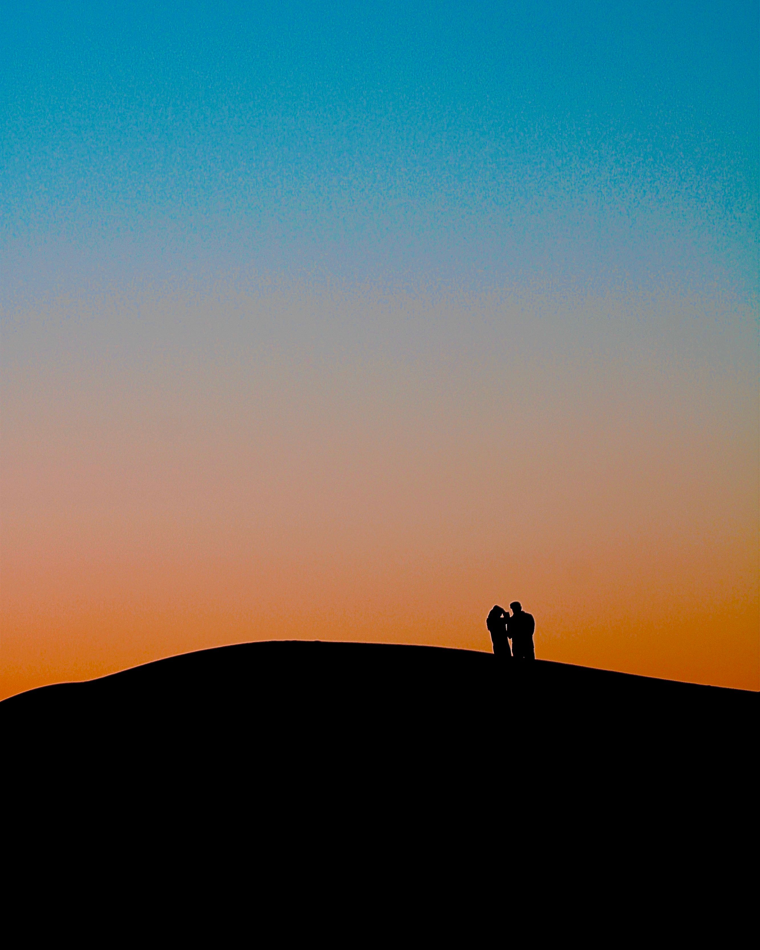 Silhouette of Couple during Sunset · Free Stock Photo
