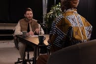 A Man Talking to a Woman