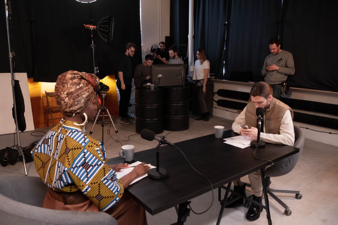 A picture of people during a TV interview