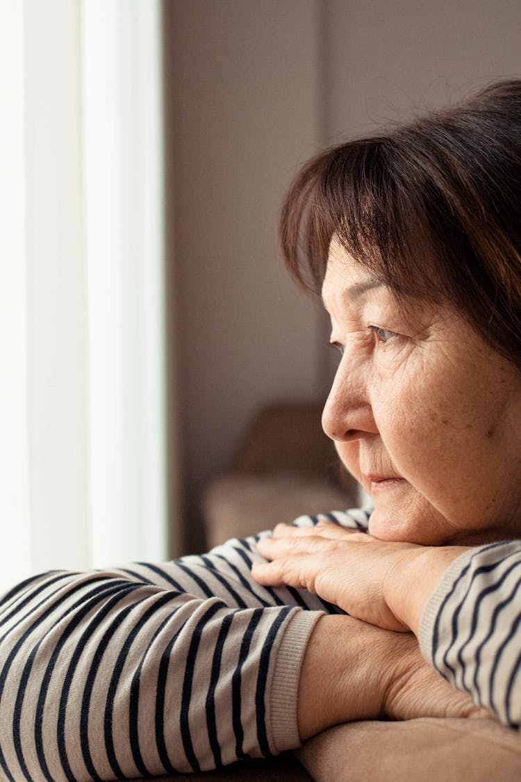 Asian Woman With Wrinkles At Home