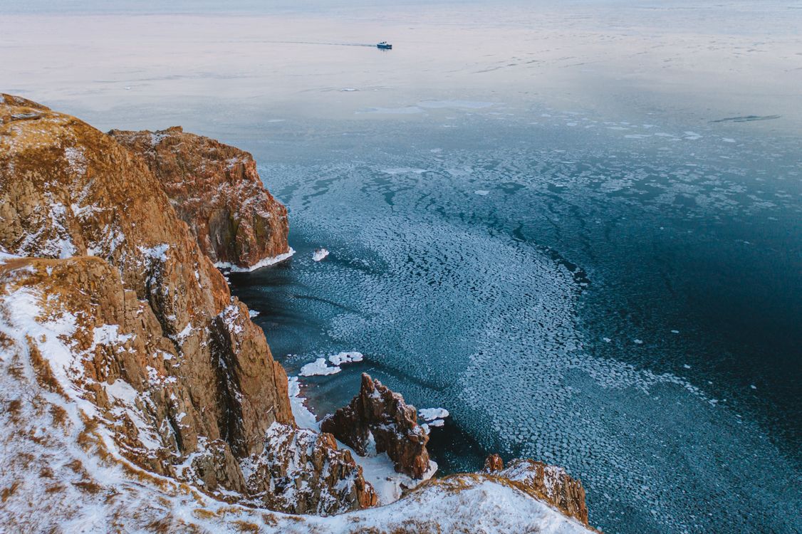 Drone Footage of a Sea with Snow · Free Stock Photo