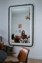 Woman in Red Shirt Sitting on Chair