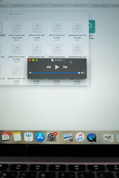 Close-up view of a music player interface displayed on a laptop screen.
