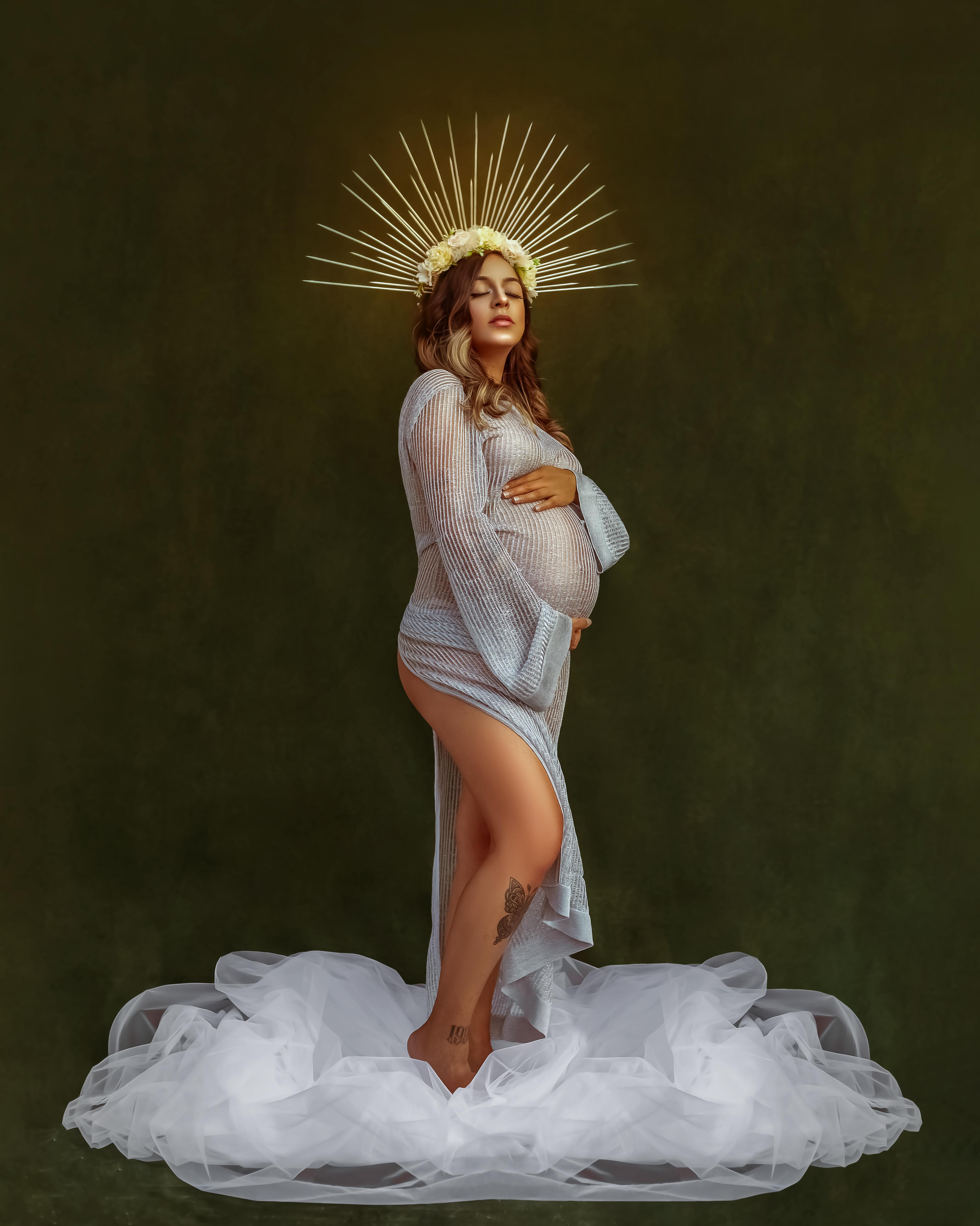 pregnant female with halo on head