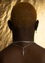 Back View of a Man wearing Necklace