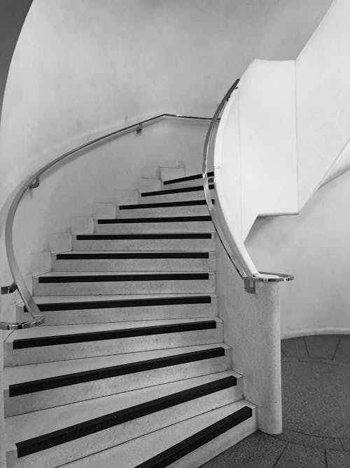 A Grayscale Photo of a Stairwell