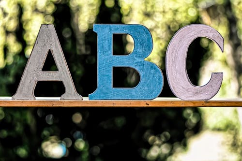 Free Letter Blocks in Close Up Photography Stock Photo