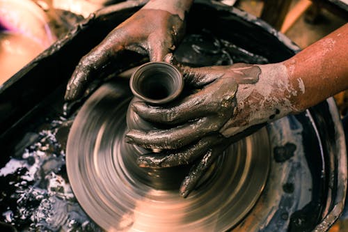 Free Person Making Clay Pot With Clay Stock Photo